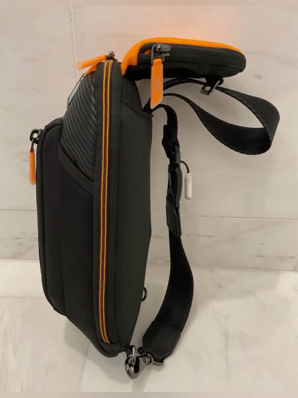 NEW Tumi McLaren Esports Downforce PRO Sling Crossbody - Black & Papaya Orange